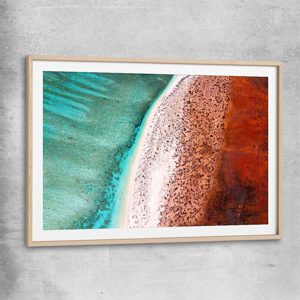 Beach and coastal wall art print of Cape Range Aerial with raw oak glass front frame