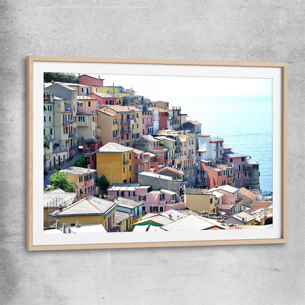 Beach and coastal wall art print of Cinque Terre with raw oak glass front frame