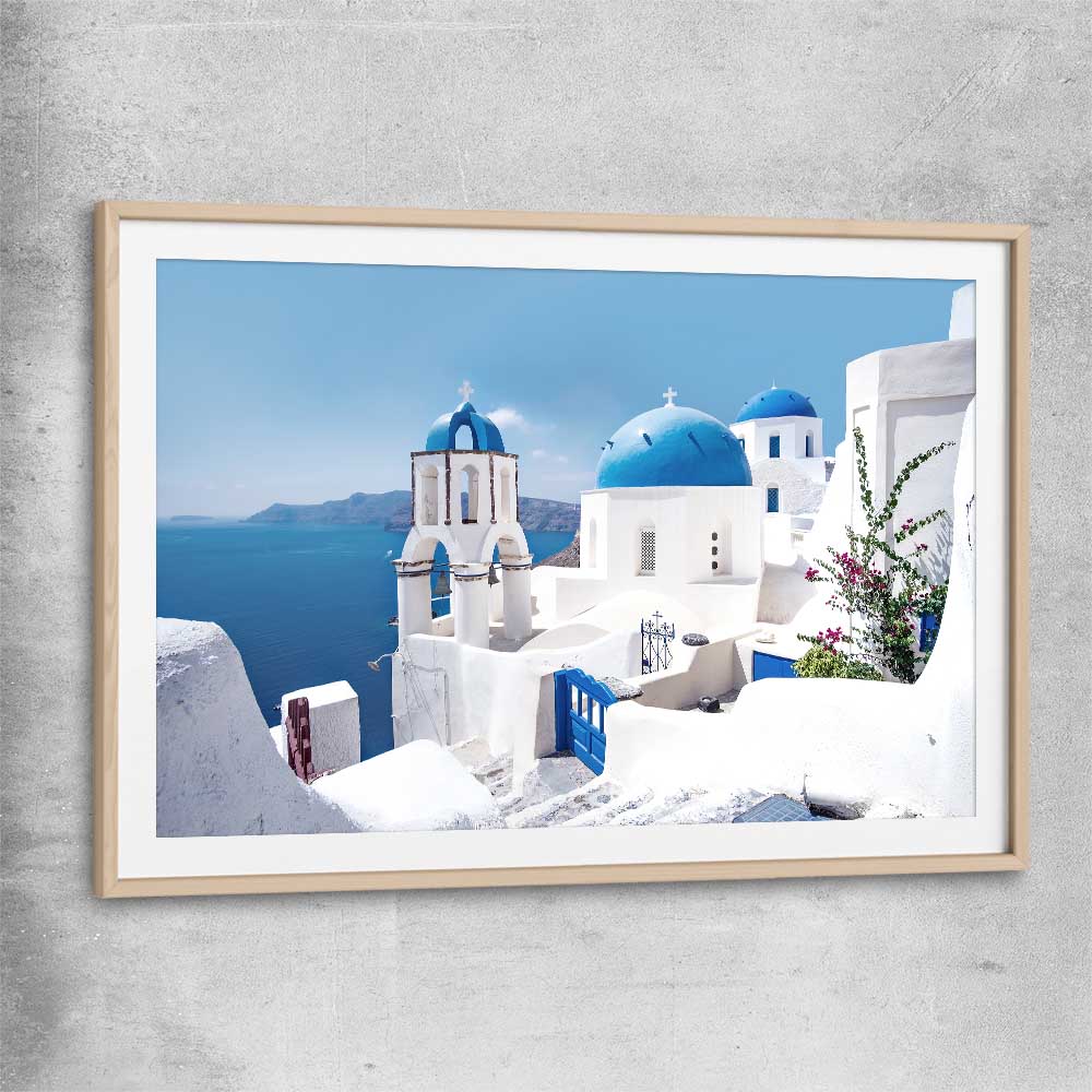 Beach and coastal wall art print of Santorini Views with raw oak glass front frame
