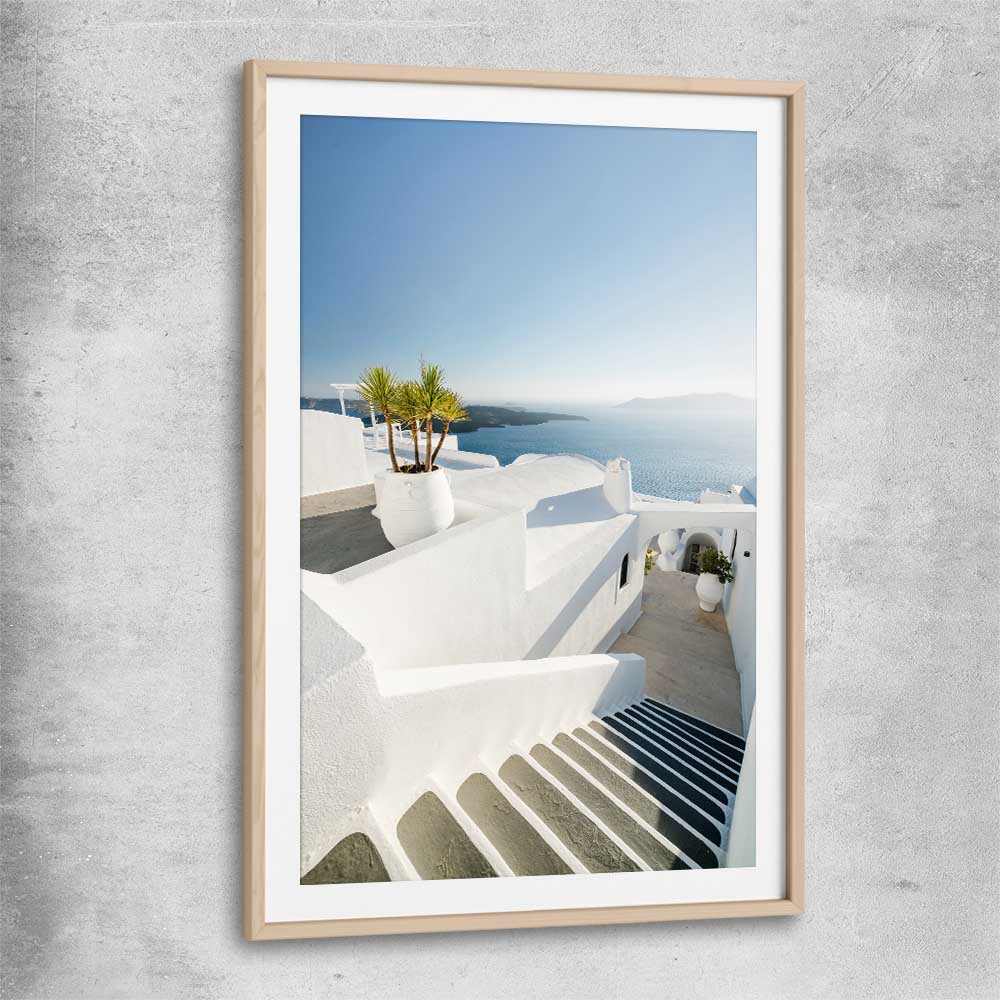 Beach and coastal wall art print of Santorini Walkway with raw oak glass front frame