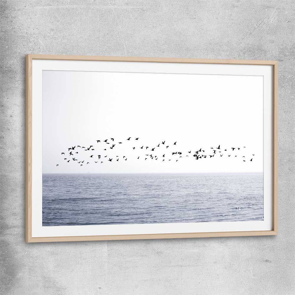 Beach and coastal wall art print of Seagull Flock with raw oak glass front frame