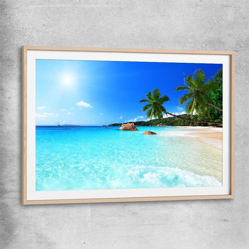 Beach and coastal wall art print of Seychelles Crystal Water with raw oak glass front frame