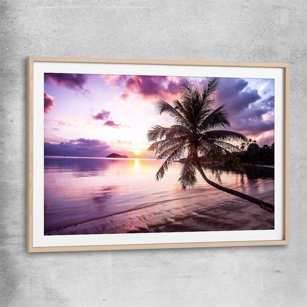 Beach and coastal wall art print of Tropical Sunset with raw oak glass front frame