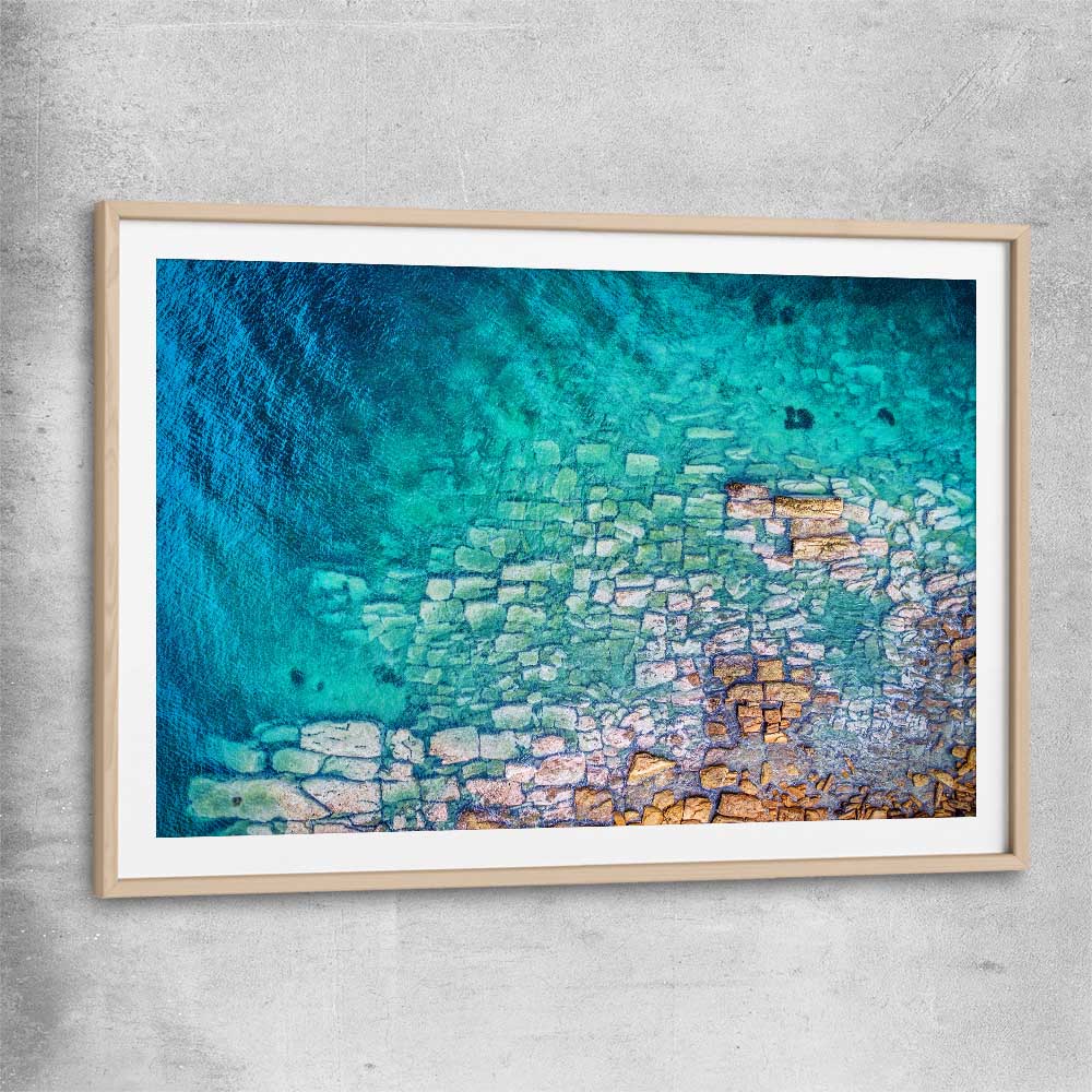 Beach and coastal wall art print of Watsons Bay Rocks with raw oak glass front frame