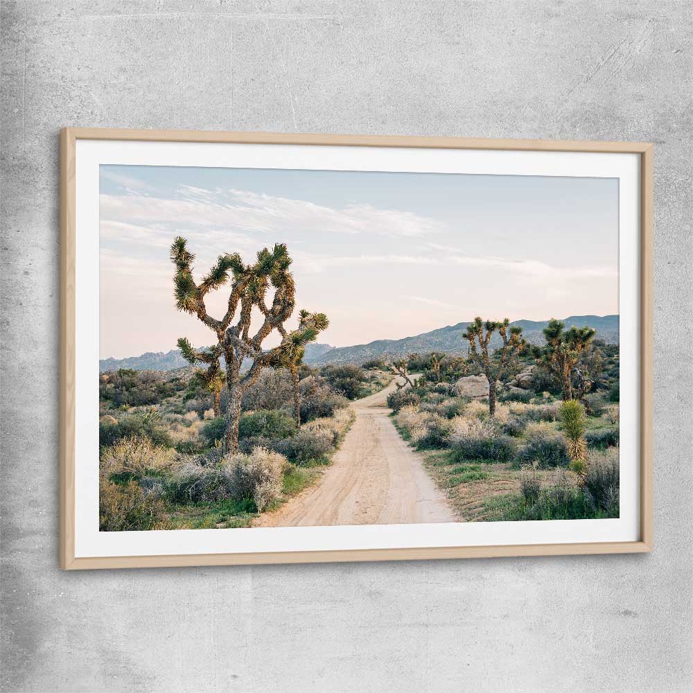Floral print of California Desert with raw oak glass front frame