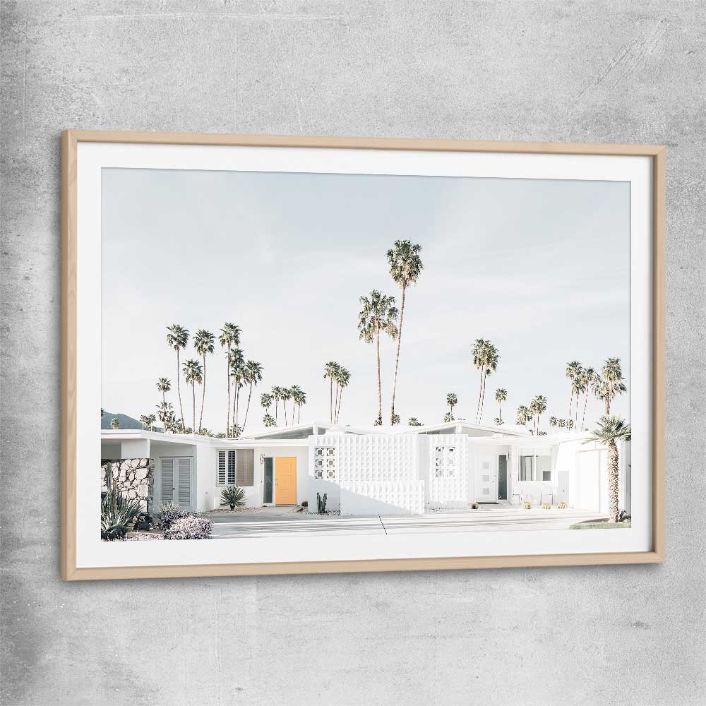 Floral print of Palm Springs with raw oak glass front frame