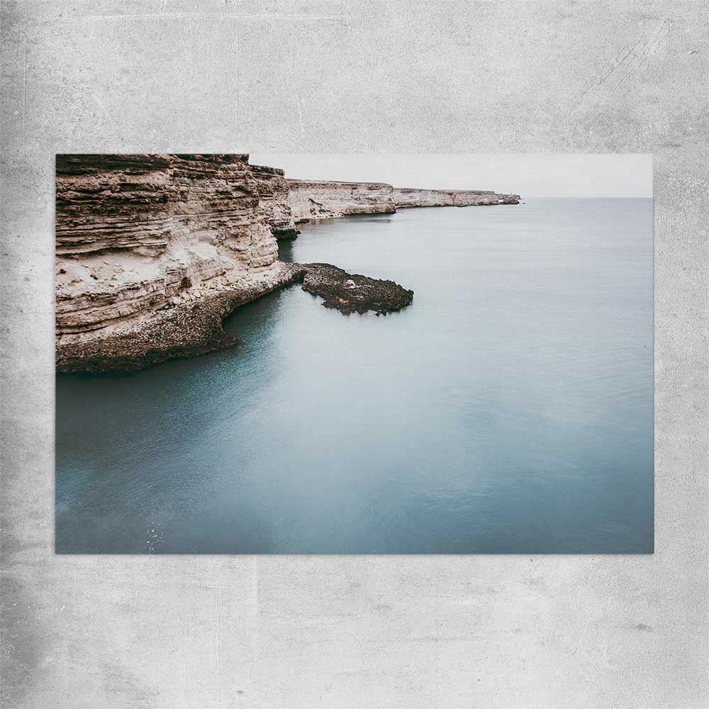 Beach and coastal wall art print of Quiet Waters on a rolled print