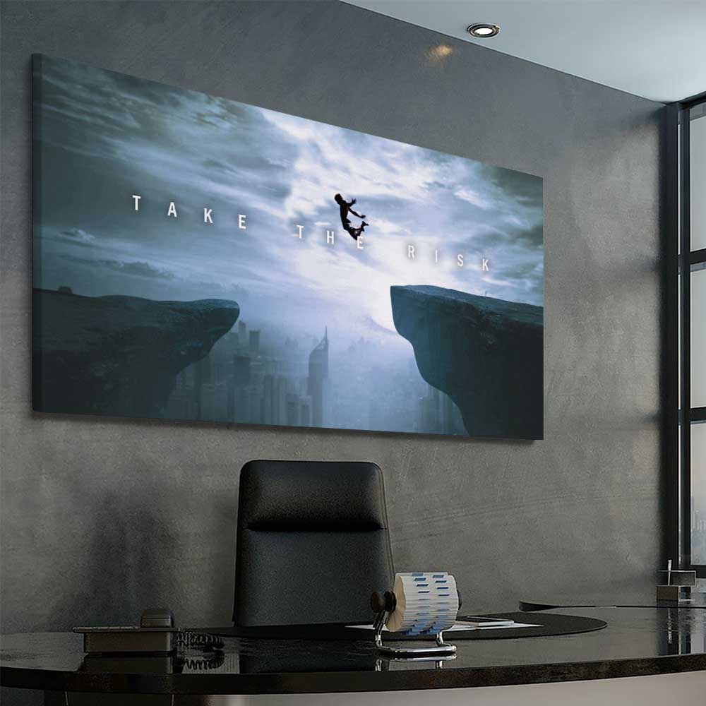 Inspirational wall art print of Risk It on a stretched canvas displayed from an angle in a room