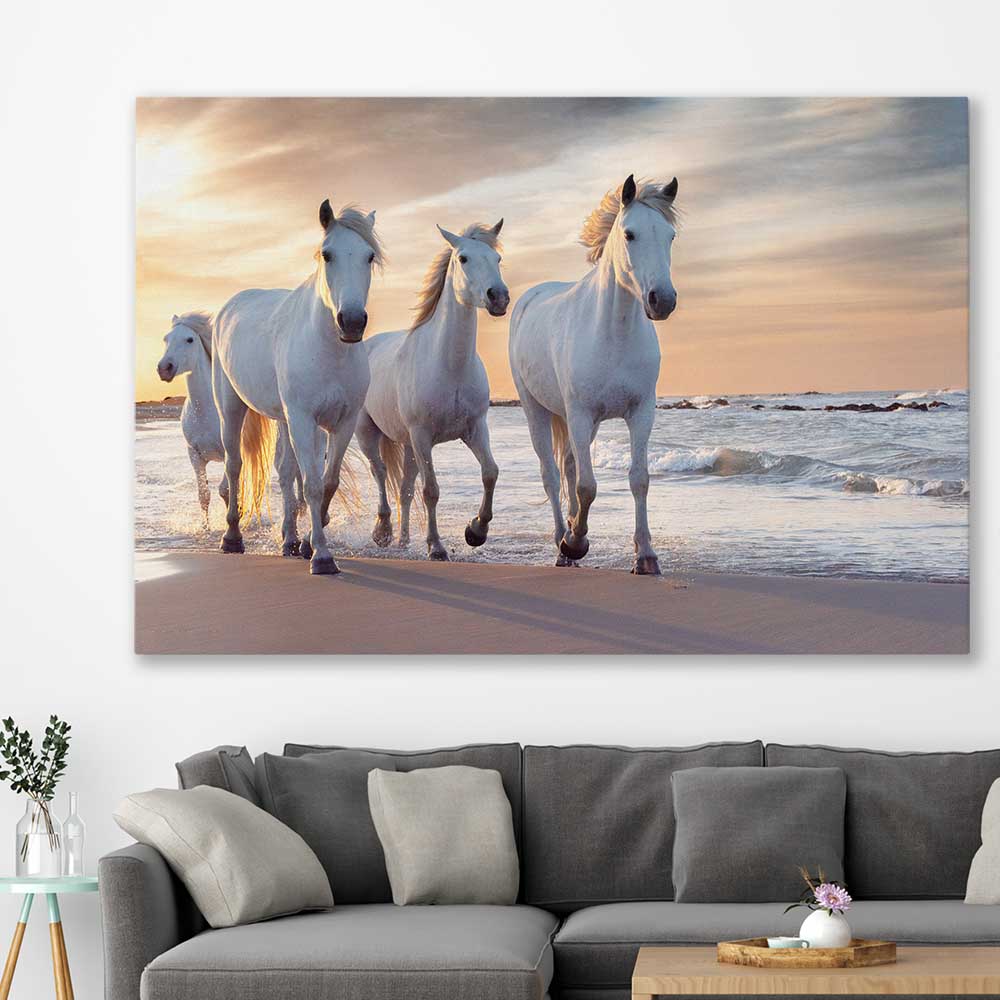 Animal wall art and canvas prints of Ocean Breeze Horses on a stretched canvas displayed in a room