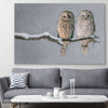 Animal wall art and canvas prints of Perched Owls on a stretched canvas displayed in a room