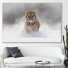 Animal wall art and canvas prints of Snow Tiger Charge on a stretched canvas displayed in a room