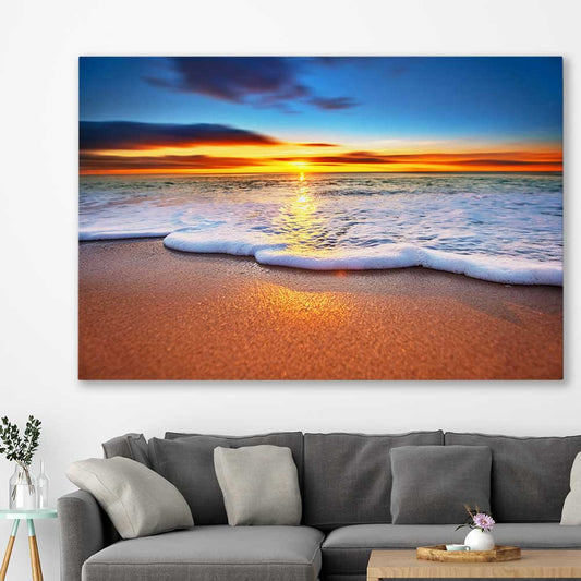 Beach and coastal wall art print of Radiant Ocean Sunset on a stretched canvas displayed in a room