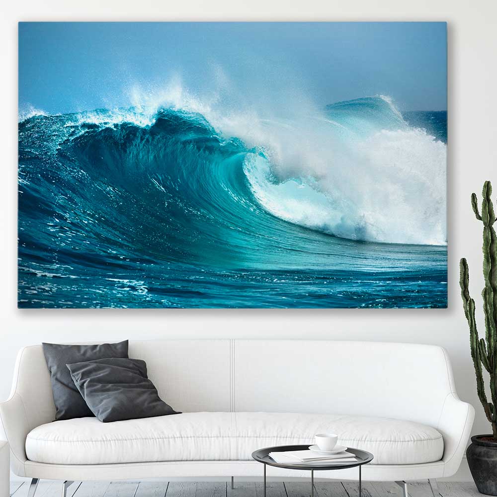 Beach and coastal wall art print of Turquoise Wave Break on a stretched canvas displayed in a room
