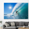Beach and coastal wall art print of Blue Ocean Surfer on a stretched canvas displayed in a room