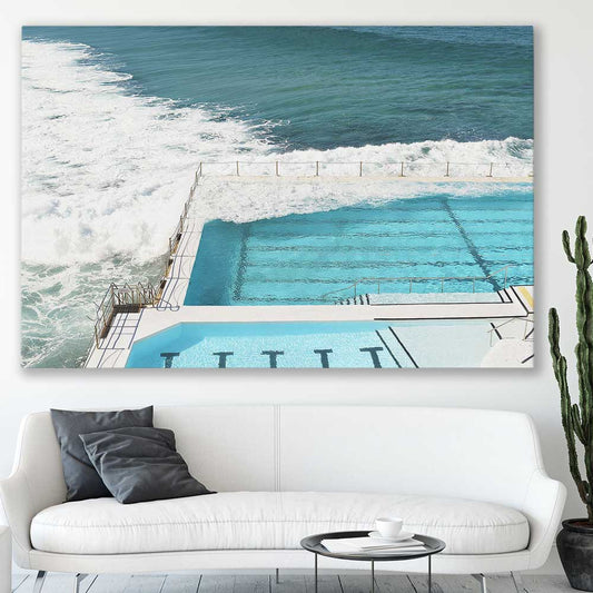 Beach and coastal wall art print of Bondi Iceberg Tide on a stretched canvas displayed in a room