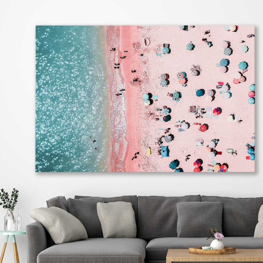 Beach and coastal wall art print of Bondi Pink Aerial on a stretched canvas displayed in a room