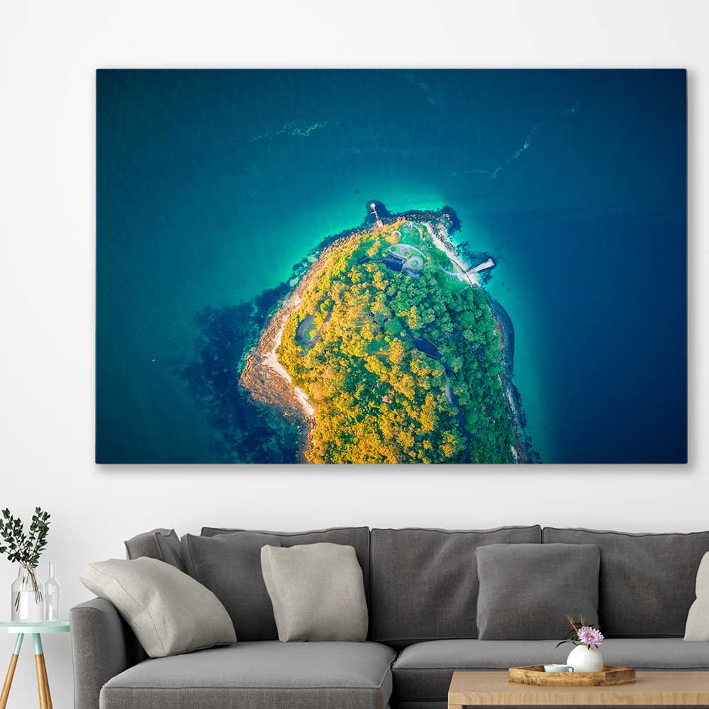 Beach and coastal wall art print of Bradleys Head Aerial on a stretched canvas displayed in a room