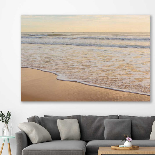 Beach and coastal wall art print of Calm Tides on a stretched canvas displayed in a room