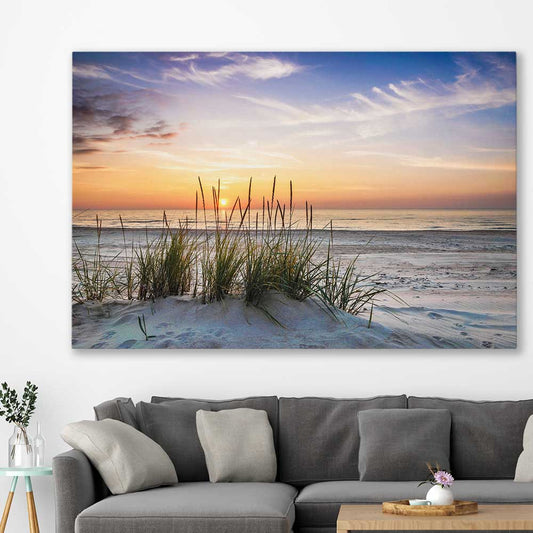 Beach and coastal wall art print of Calming Sunset on a stretched canvas displayed in a room