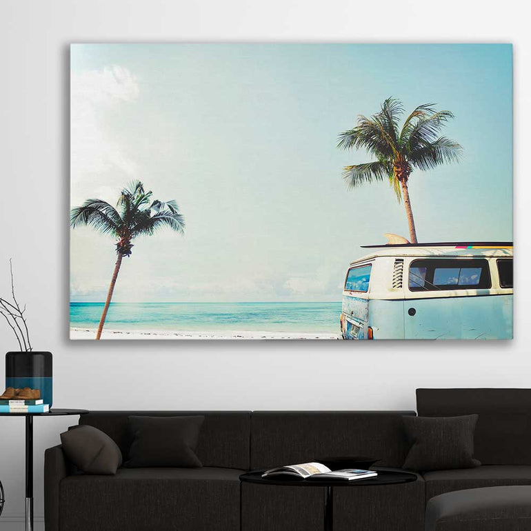 Beach and coastal wall art print of Combi Van Palms on a stretched canvas displayed in a room