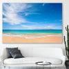 Beach and coastal wall art print of Endless Blue Horizon on a stretched canvas displayed in a room