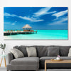 Beach and coastal wall art print of Exotic Beach Bar on a stretched canvas displayed in a room
