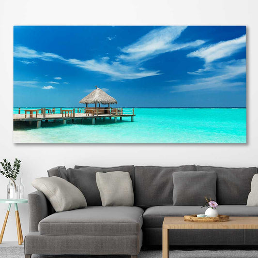 Beach and coastal wall art print of Exotic Beach Bar on a stretched canvas displayed in a room