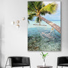 Beach and coastal wall art print of Maldives Hammock on a stretched canvas displayed in a room