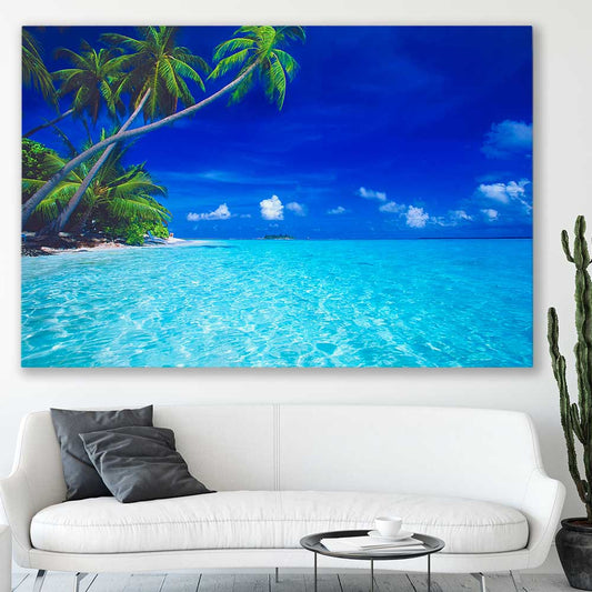 Beach and coastal wall art print of Paradise Shore on a stretched canvas displayed in a room