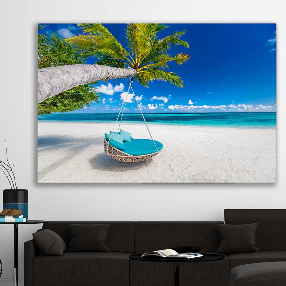 Beach and coastal wall art print of Paradise Swing on a stretched canvas displayed in a room