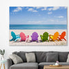 Beach and coastal wall art print of Pastel Chairs on a stretched canvas displayed in a room