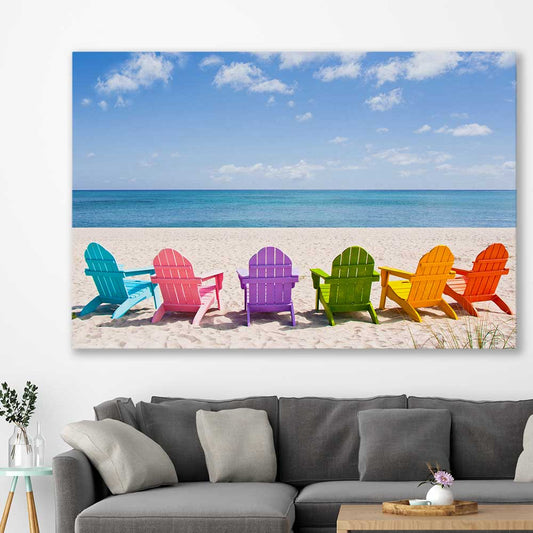 Beach and coastal wall art print of Pastel Chairs on a stretched canvas displayed in a room