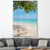 Beach and coastal wall art print of Pristine Beach Swing on a stretched canvas displayed in a room