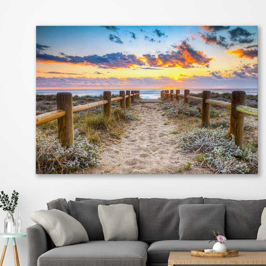 Beach and coastal wall art print of Quiet Sunset Walk on a stretched canvas displayed in a room