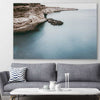 Beach and coastal wall art print of Quiet Waters on a stretched canvas displayed in a room