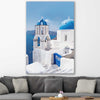 Beach and coastal wall art print of Santorini Dreaming on a stretched canvas displayed in a room
