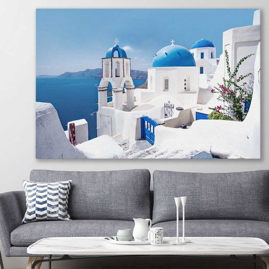 Beach and coastal wall art print of Santorini Views on a stretched canvas displayed in a room