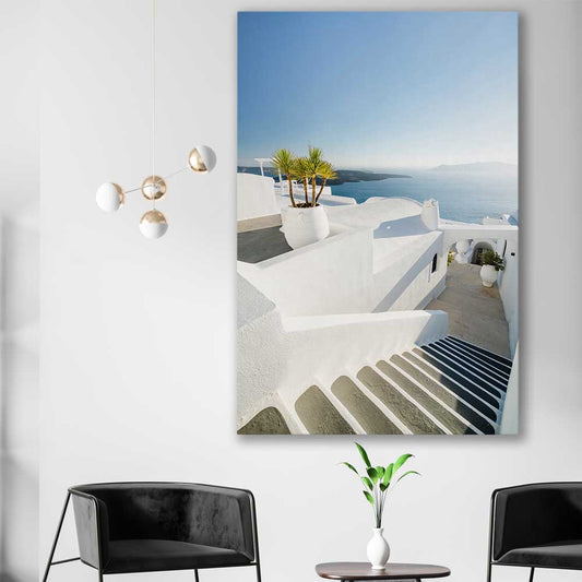 Beach and coastal wall art print of Santorini Walkway on a stretched canvas displayed in a room