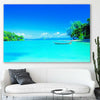 Beach and coastal wall art print of Serene Island Waters on a stretched canvas displayed in a room