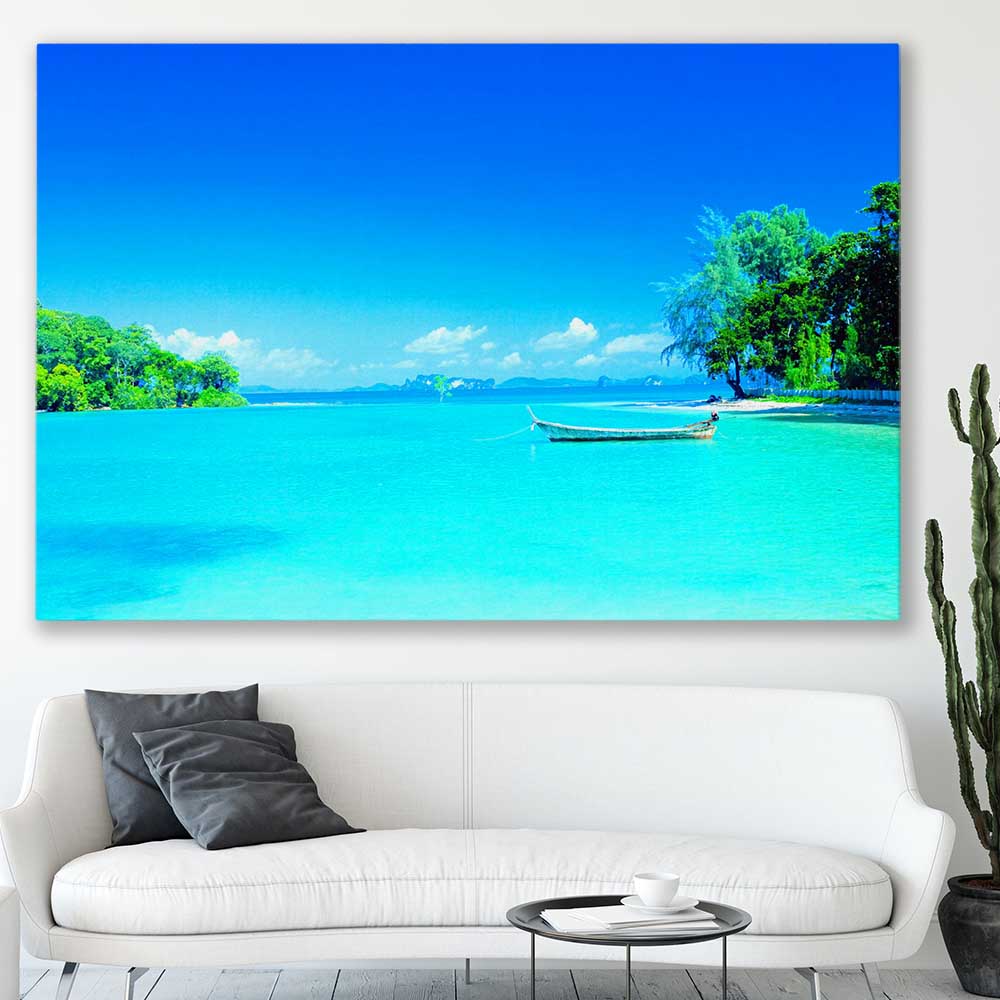 Beach and coastal wall art print of Serene Island Waters on a stretched canvas displayed in a room