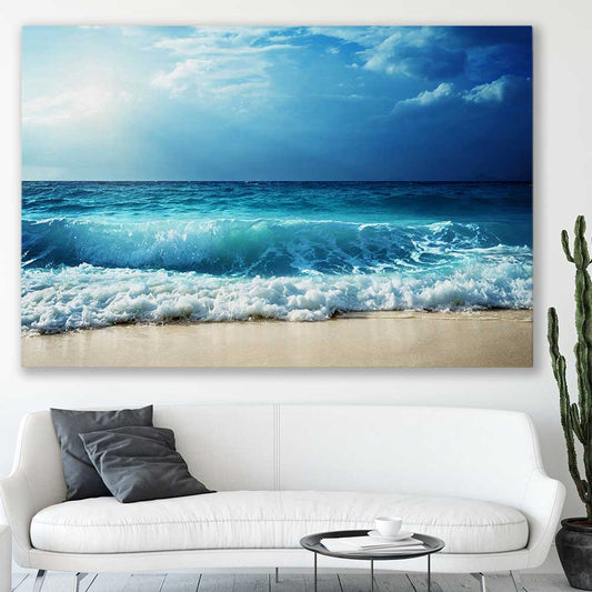 Beach and coastal wall art print of Seychelles Beach Waves on a stretched canvas displayed in a room