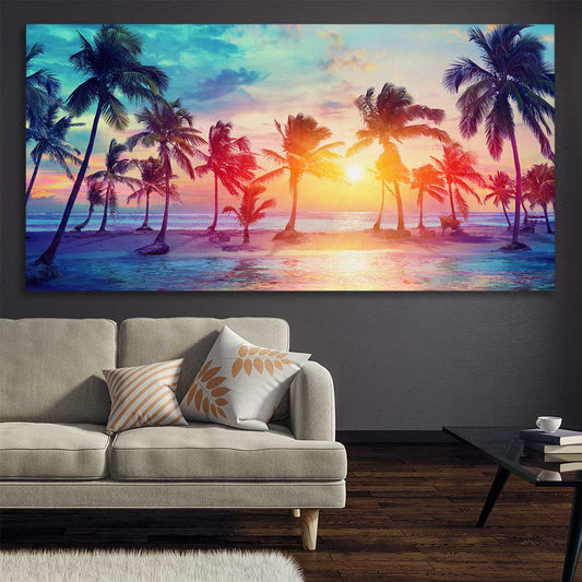 Beach and coastal wall art print of Sunset Palm Glow on a stretched canvas displayed in a room