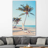 Beach and coastal wall art print of Surfing Break on a stretched canvas displayed in a room