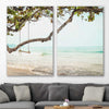 Beach and coastal wall art print of Tropical Beach Pair on a stretched canvas displayed in a room