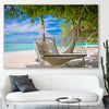 Beach and coastal wall art print of Tropical Bliss on a stretched canvas displayed in a room