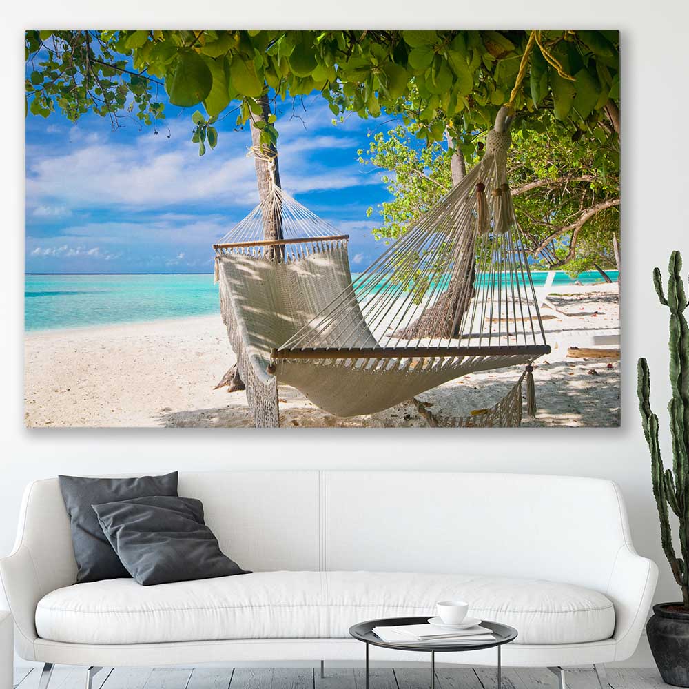 Beach and coastal wall art print of Tropical Bliss on a stretched canvas displayed in a room