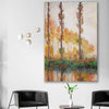 Classic wall art and canvas print of Poplars Claude Monet on a stretched canvas displayed in a room