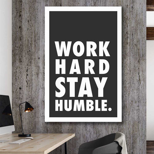 Inspirational wall art print of Work Hard on a stretched canvas displayed in a room