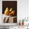 Three Pears stretched canvas displayed in a room is a colourful and stylish canvas wall art and print suited for the kitchen area