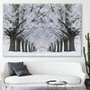 Floral print of Winter Tree Avenue on a stretched canvas displayed in a room